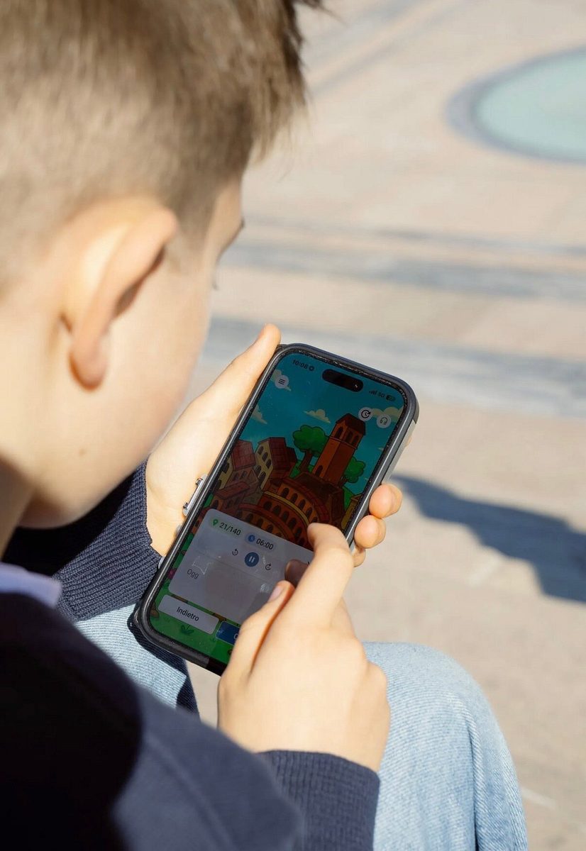 Close-up of the LooksArt app screen in a child’s hands