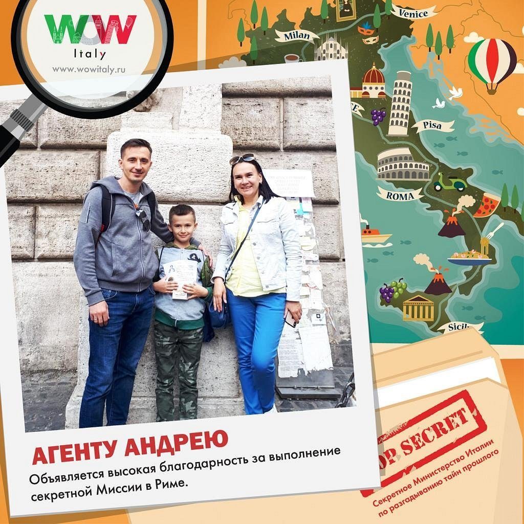 A family by a board with the map of Italy and the quest certificate