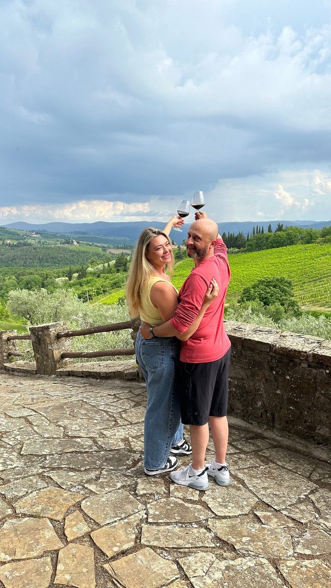 Mother and child at a viewpoint in Tuscany